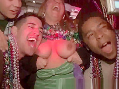 Group of hawt hotties showing their milk sacks at Mardi Gras