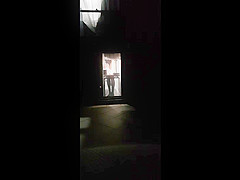 Window voyeur of Oriental college student changing