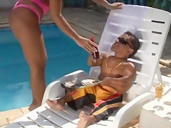 Large chap bonks sexy dark brown at the pool