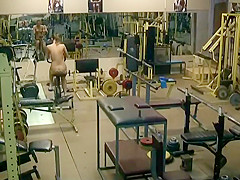 Stripped lady spied exercising in a gym