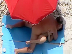 Boy strokes and pair copulates in beach
