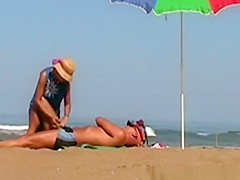 Wife tugjob at beach