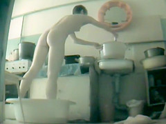 Poor woman spied as that babe washes herself