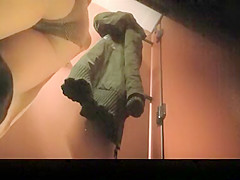 Woman spied drying and dressing