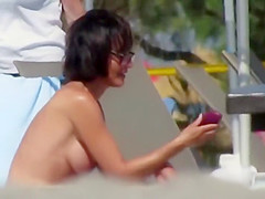 Delightful topless hottie with large pointer sisters