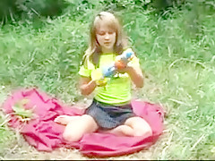 Ravishing angel plays outside