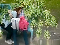 Hotty oral-stimulation in a public park.