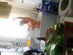 Woman spied in bathtub washing