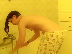 Hotty washing herself and her shaggy bush