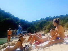 Peeking on some bewitching topless beauties