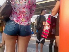 Woman with good a-hole in taut shorts