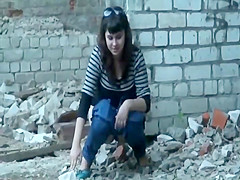 Chicks caught pissing in an old building