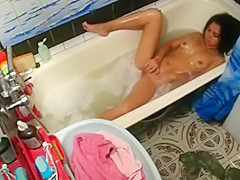 Spying sister's big O in a bathtub