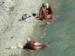 2 nudist couples spied at rocky beach
