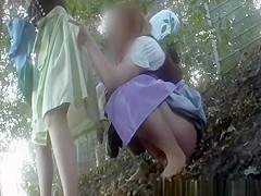 Babes caught peeing in inclined ground