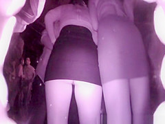 Voyeur in the disco with spy camera upskirts