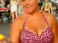 Aged woman playing beer pong