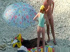 Nudist pair goes take a swim