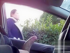 Sitting in a parked car and masturbating dick