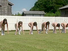 Playful Japanese bimbos run around the soccer field totally undressed