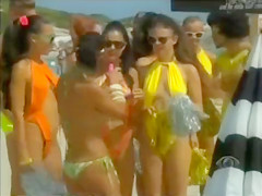 Hot dolls wearing constricted bikinis show off their appetizing curves