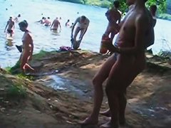 Hidden livecam episode taken during the time that strolling throughout a nudist beach