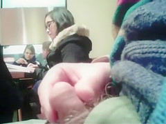 Brave boy strokes his 10-Pounder in the public library