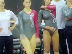Adorable gymnast with large booty performs some astounding moves