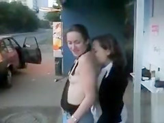 Playful Russian hottie whips out her zeppelins and let a lewd pair touch her