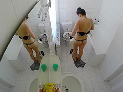 Glamorous housewife removes her garments in order to wash her wet holes