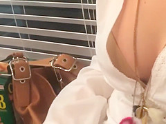 Intriguing brunette hair and her desirable cleavage