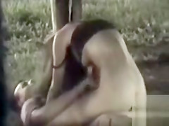 Miniature angel rides on top of her ally's weenie in the town park