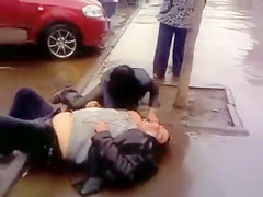 Drunk boss and his mad secretary on the street