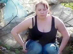 Curvy sweetheart takes a rock hard pee in the park