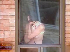 Kinky lady in latex suit does a wicked dance