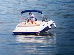 Palatable hottie sucks on a 10-Pounder in the centre of the sea