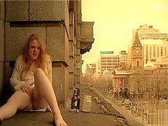 Ginger gal masturbates in public outside her apartment