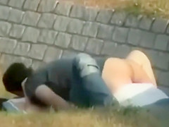 Juvenile German pair fucking in the grass for a lengthy time