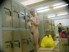 Filming her diminutive body in the locker room