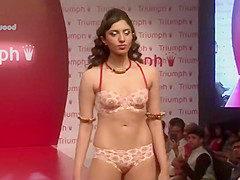 Four chicks in underware walk the runway