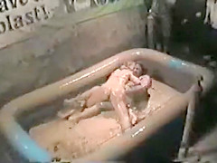 Mud wrestling gals at the bar make a hot mess