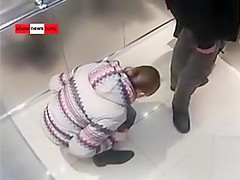 Russian news clip of sister peeing in the elevator
