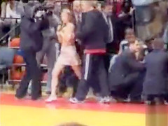 Topless angel streaks at a basketball game