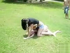 Suburban gals fight for real in the grass