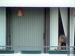 My slender blond neighbour undressed in her apartment