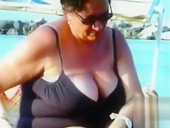 Big saggy bra buddies in bikini tops by the pool