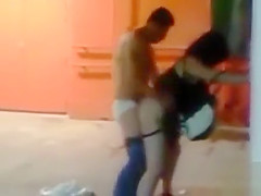 Lustful paramours copulate doggy style in an alley