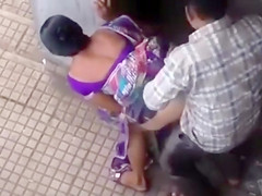 Public from behind quickie with an Indian cutie