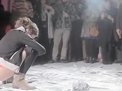 Pissing protest with fotos of political leaders moist