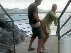 Pounding her love aperture by the sea